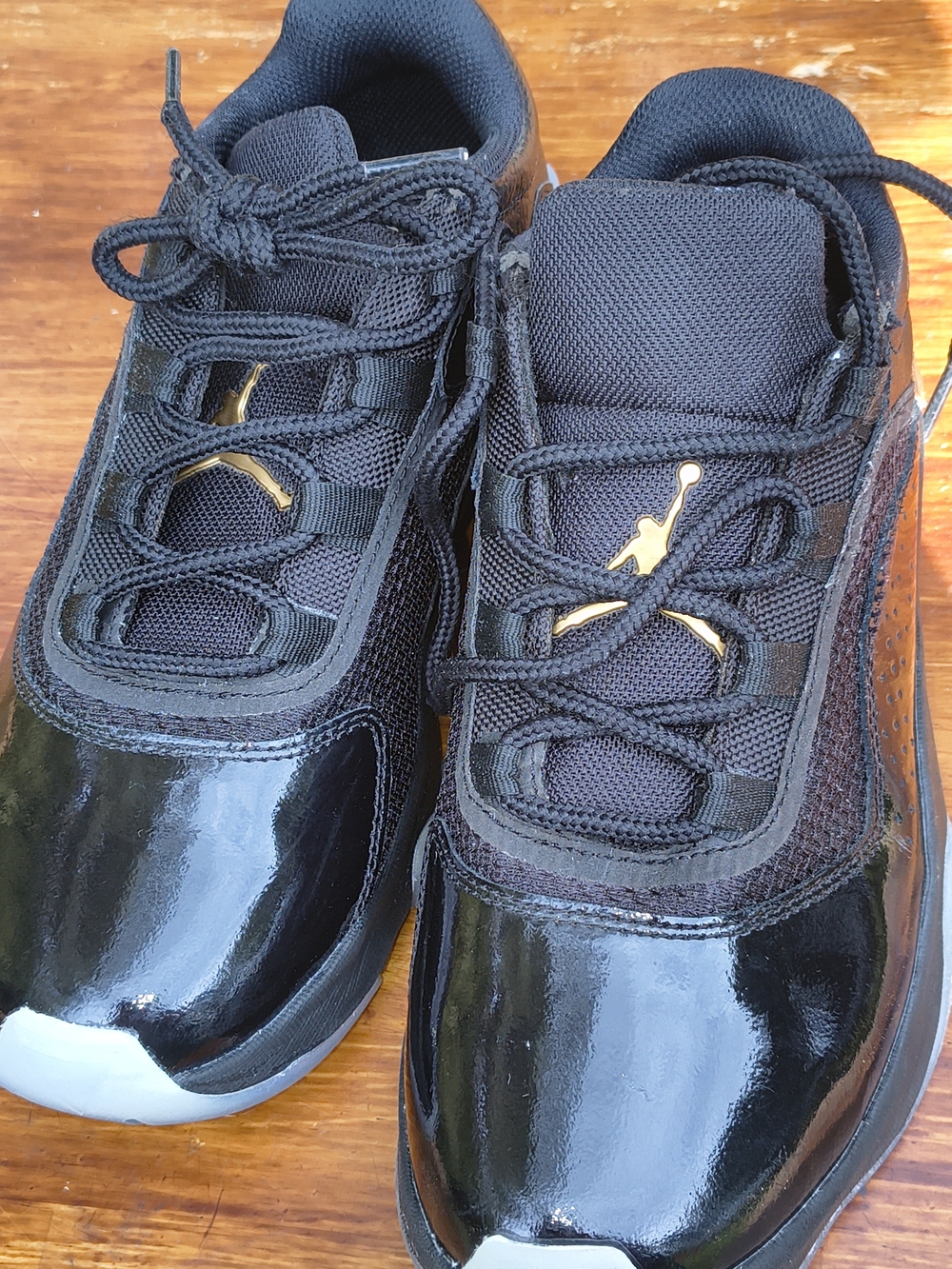 Jordan Women's Black and Gold Low-Top Athletic Shoes